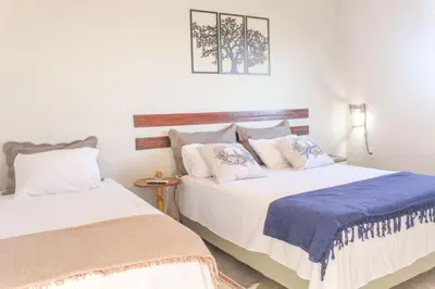 Uma cama ou camas num quarto em Vila Serenitá