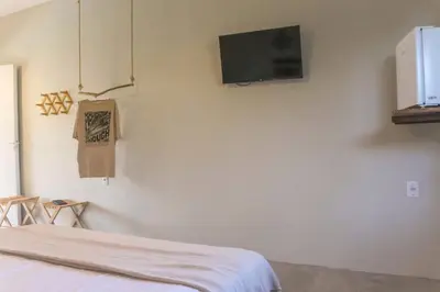 Uma televisão e/ou sistema de entretenimento em Vila Serenitá