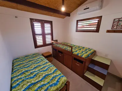 Uma cama ou camas num quarto em Casa na Beira do Mar, Peroba, Icapuí/CE, Morada Mariana