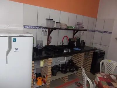 A cozinha ou kitchenette de CHALÉ COQUEIROS