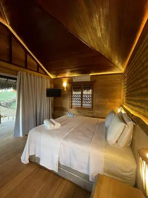 Uma cama ou camas num quarto em Collina Beach