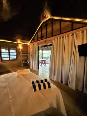 Uma cama ou camas num quarto em Collina Beach
