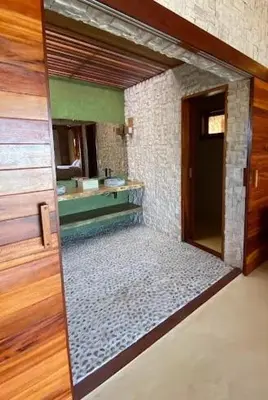 Uma cama ou camas num quarto em Collina Beach