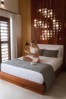 Uma cama ou camas num quarto em Villa Nautica Boutique Hotel