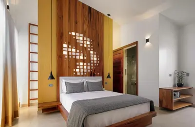 Uma cama ou camas num quarto em Villa Nautica Boutique Hotel