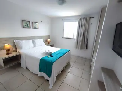 Uma cama ou camas num quarto em Golf Ville Resorts 3 Suites