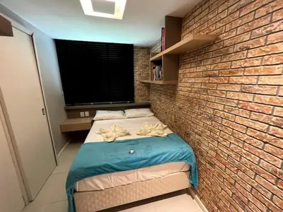 Uma cama ou camas num quarto em Golf Ville Resorts 3 Suites