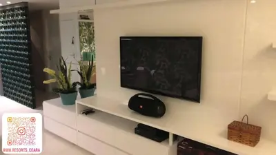 Uma televisão e/ou sistema de entretenimento em Golf Ville Resorts 3 Suites
