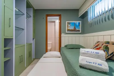 Uma cama ou camas num quarto em Scopa Beach #C2100 - Porto das Dunas por Carpediem