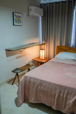 Uma cama ou camas num quarto em Apartamento Vista mar melhor localização da cidade