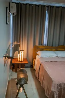 Uma cama ou camas num quarto em Apartamento Vista mar melhor localização da cidade