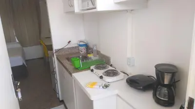 A cozinha ou kitchenette de 104 Apart mobiliado vista mar Praia de Iracema
