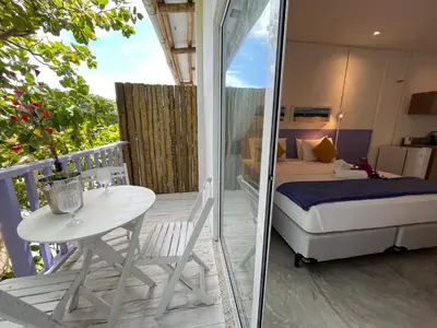 Uma cama ou camas num quarto em Saint Germain Wind Residence