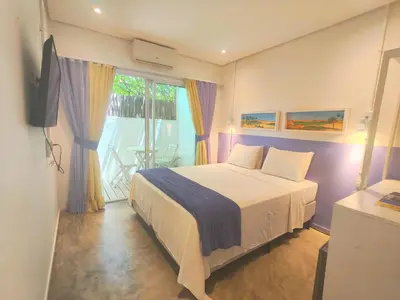 Uma cama ou camas num quarto em Saint Germain Wind Residence