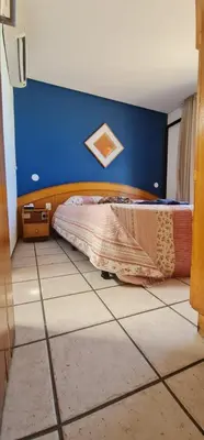 Uma cama ou camas num quarto em CLASSIC FLAT RESIDENCE Beira Mar- 1004