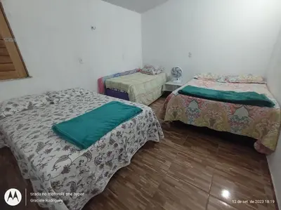 Uma cama ou camas num quarto em Suíte GUARAMIRANGA no Sítio