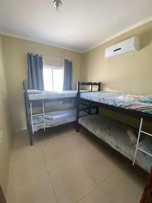 Uma cama ou camas num quarto em Boas Vistas Canoa Quebrada