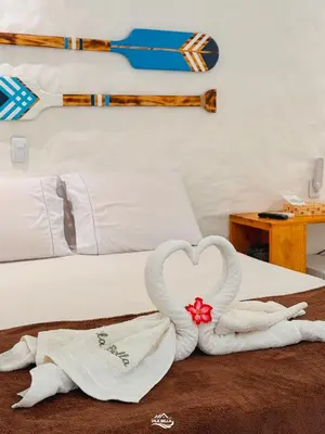 Uma cama ou camas num quarto em Pousada Vila Bella Icaraí