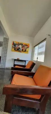 Uma área de estar em Pousada Temporada Atlântica