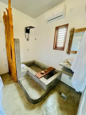 Uma cama ou camas num quarto em Villa Yvytu - Praia do Preá