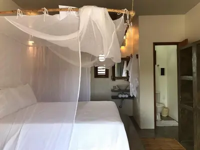 Uma cama ou camas num quarto em Villa Yvytu - Praia do Preá