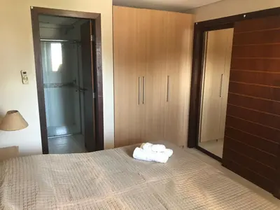 Uma cama ou camas num quarto em Kariri Beach - 207 - Praia do Cumbuco, Caucaia