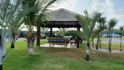 Um jardim no exterior de Vg Sun Cumbuco