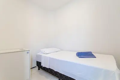 Uma cama ou camas num quarto em Beach Townhouses #C06 - Com Jacuzzi por Carpediem