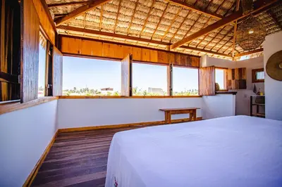 Uma cama ou camas num quarto em Bangalô do Vento - Praia do Preá
