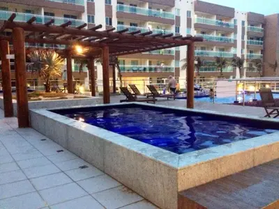 A piscina em ou perto de VG fun - Apto Suíte Pé na Areia