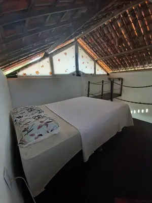 Uma cama ou camas num quarto em Pousada Refúgio do Manatí