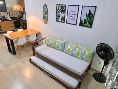 Uma área de estar em Aloha Vibes Ap Cumbuco -Beach Place
