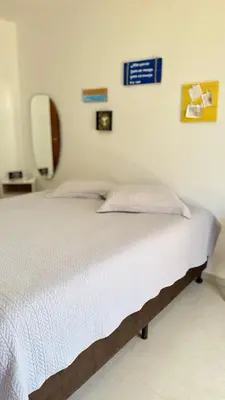 Uma cama ou camas num quarto em Lounge Pdd - Espaço inteiro