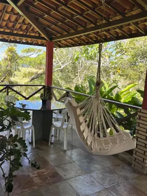 Uma varanda ou terraço em Sítio São Gerardo - Aconchegante casa no campo.
