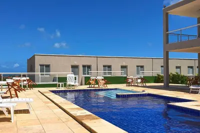 A piscina em ou perto de Beach Townhouses #C05 - Com Jacuzzi por Carpediem