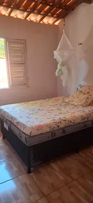 Uma cama ou camas num quarto em Recanto Silvia Timbó