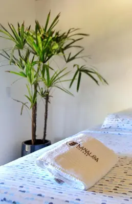 Uma cama ou camas num quarto em Kanaloa Village 02