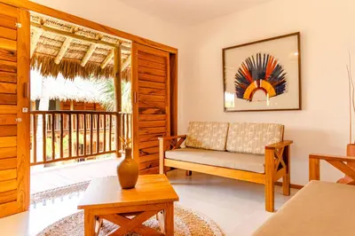 Uma área de estar em UNKUÉ POUSADA FLATS
