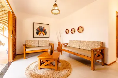 Uma área de estar em UNKUÉ POUSADA FLATS