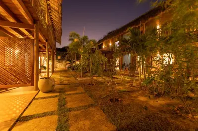 Um jardim no exterior de UNKUÉ POUSADA FLATS