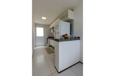 A cozinha ou kitchenette de Beach Townhouses #C7 - Com jacuzzi by Carpediem