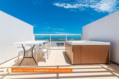 Uma varanda ou terraço em Beach Townhouses #C7 - Com jacuzzi by Carpediem