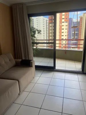 Uma área de estar em Flat Aconchegante - Praia de Iracema - Fortaleza - Ceará