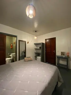 Uma cama ou camas num quarto em Casa Praiana Moitas