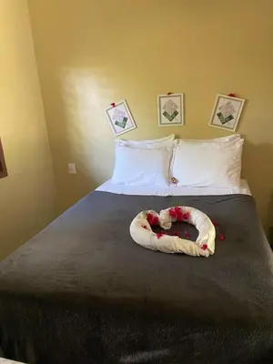 Uma cama ou camas num quarto em Casa Praiana Moitas