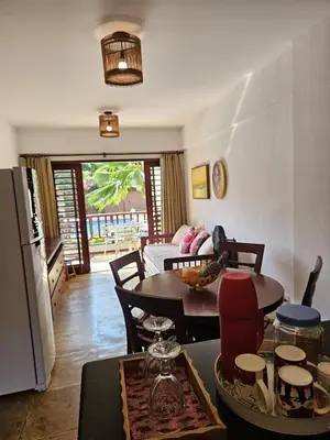 Uma área de estar em Apartamento pé na areia Cumbuco