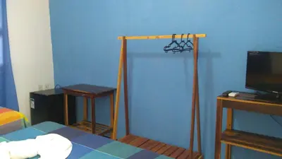 Uma televisão e/ou sistema de entretenimento em EDEN Pousada