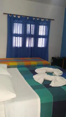 Uma cama ou camas num quarto em EDEN Pousada