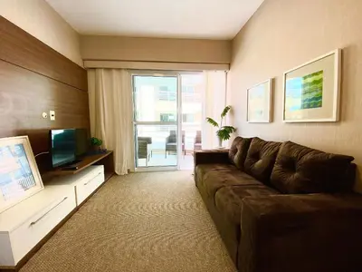 Uma área de estar em Lindo Apto no Cumbuco por Be My Guest