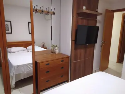 Uma cama ou camas num quarto em Porto das Dunas a 300m do Beach Park Paraíso